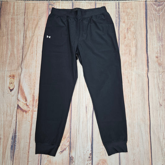 UA WMNS RIVAL HI RISE PANT BLACK 1082727
