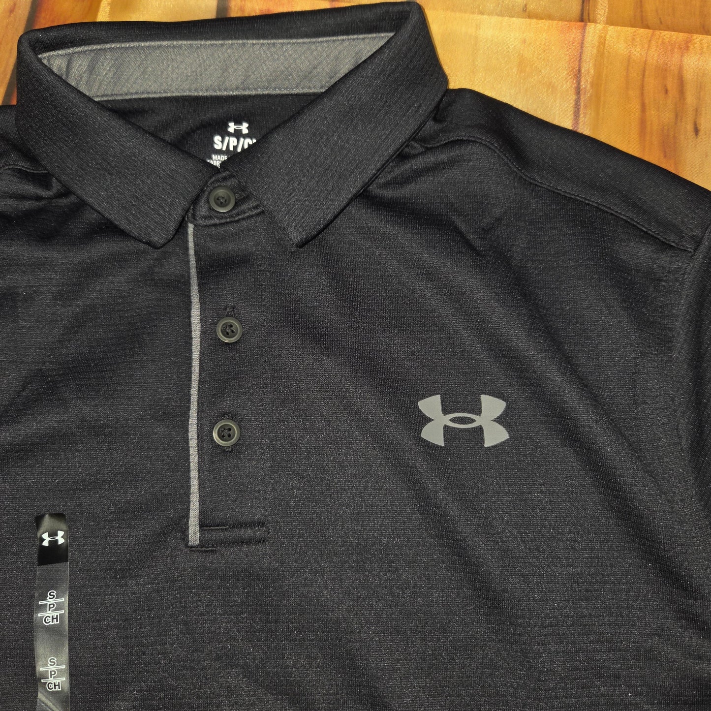 UA MENS TECH BLACK POLO 1290140-001